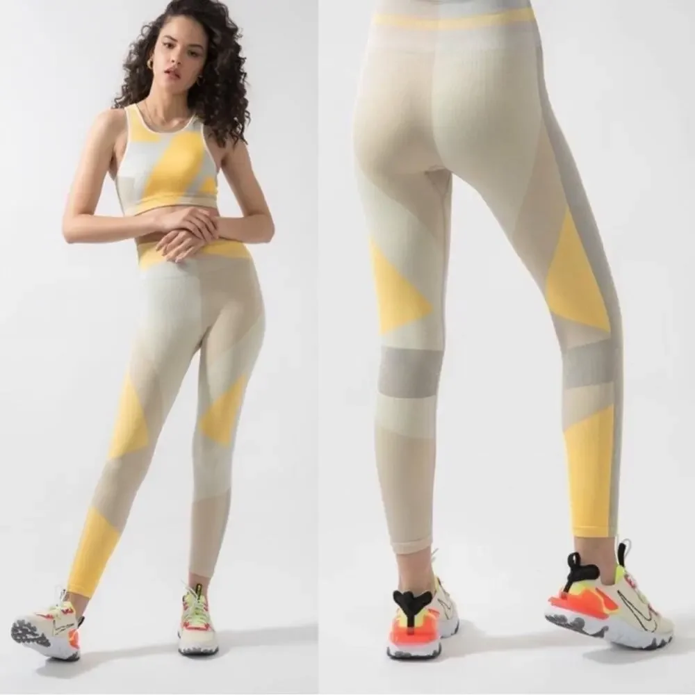 NIKE Sculpt LUX ICON CLASH Seamless 7/8 Training Knit Leggings yellow colorblock